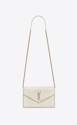 YSL Cassandre Envelope Chain Wallet In Metallized Läder Guld | QJA093716